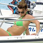 Pic of Coleen Rooney in green bikini on a beach