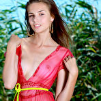 Pic of Elle Tan strips outdoors baring her slender body and smooth pussy. naked