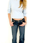 Pic of Estella Warren in jeans and blue sweater