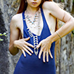 Pic of Slender Milena Angel stripping and teasing outside