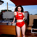 Pic of Annabel Redd shows off her big boobs and hairy pussy in the jacuzzi