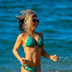 Pic of Stacy Ferguson in geen bikini on a beach