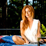 Pic of Alluring Michelle H shows off her lusty body in the woods.