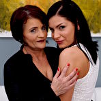 Pic of Hot babe having fun with a horny mature lesbian