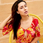 Pic of Angelina Socho Strips in a Chair 