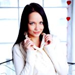 Pic of Brunette In A Tight White Sweater
