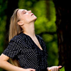 Pic of Vika P posing naked in a forest to reveal her sexy curves at pussyxxxporn.com