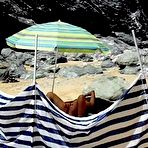 Pic of Amateur wife masturbating on public beach at AmateurPorn.me