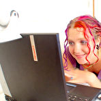 Pic of Tattooed redhead Amanda Kitten gets naked and fucks herself with glass dildo on webcam