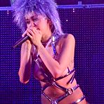 Pic of Miley Cyrus Performs Topless With A Strap-on And Takes Dollars Up Her Ass