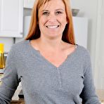 Pic of Naughty milf Anita Coxxx removes her jeans and undies to give a close-up of her experienced snatch