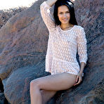 Pic of Dark haired brunette Lada A posing nude on rocks at pussyxxxporn.com