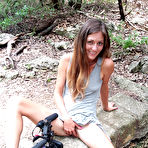 Pic of Hairy mom playing with her pussy at a public playground