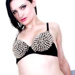 Pic of Stretched lingerie girl Annika Amour is erotically moving and stripping off