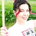 Pic of Tattooed babe Aemelia showing her tight ass on outdoor swing | Erotic Beauties