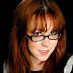 Pic of Rope tied redhead Trinity Post gets her ass slammed in the air and takes cumshot on her tongue