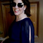 Pic of Naughty American MILF fooling around in the garden without panties