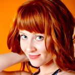 Pic of Gorgeous young redhead Polina Nubiles slips out of her lingerie to make juicy softcore porn 