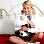 Pic of Uniform bimbo Dakota Sky exposes her well shaved nub and plays with the hole