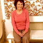 Pic of Lusty granny showing shaved pussy