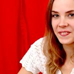 Pic of Skinny teen Emanuelle Nubiles with tiny tits strips and pets her charms by hand.