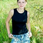 Pic of Naughty teenage babe Beth Nubiles strips by the car in the middle of the picturesque road