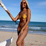 Pic of BikiniFanatics - Cute micro bikini model exposes her boobies