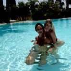 Pic of BikiniFanatics - Two big boobed bikini babes love sharing cock