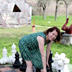 Pic of Cute mature lady playing with her pink pussy