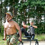 Pic of Black beefy army man gets trained as a pony and pissed on by redhead domina Janine La Teen