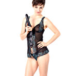 Pic of Melody Clark removing her sheer lace lingerie and toying