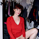 Pic of Redhead Skye Shelly with pierced pussy takes off her red socks to show her soles