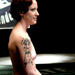 Pic of Inked redhead Nina shows how easy it is to defeat sexy wrestler Isis Love