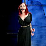 Pic of Attractive big racked redhead Mz Berlin gets tied up and blindfolded before taking master's dick