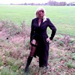 Pic of British Milf Barby opening her long coat flashing  drivers as they pass by &ndash; Exhibitionist amateurs