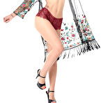 Pic of Sasha Meow strips out of her vinous lace underwear