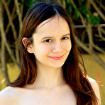 Pic of Eiby Shine flaunts her nubile body and shaved pussy outdoors.