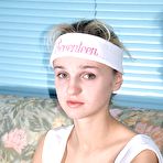 Pic of Chick inserting a big dildo into her tight teenage muff naked