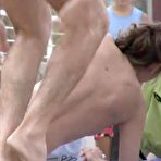 Pic of Topless cute babe expose her boobies while putting on her bra