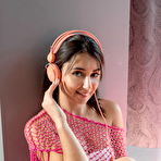 Pic of Teen charmer takes her white underwear off on her girly pink bed