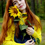 Pic of Redhead Jia Lissa strips outdoors as she displays her trimmed pussy. naked