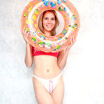 Pic of This charming blonde chick is afraid to swim in her bath without life buoy, so she takes it with her to have a hot crazy bath. free pictures