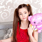 Pic of This hot and sexy teen angel poses wearing her cute outfit and spreads her legs after getting fully naked. free pictures