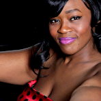 Pic of Naughty black MILF showing off her tight pussy in the car and then some