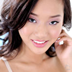 Pic of Seductive Asian brunette slides her panties to the side to masturbate - IamXXX.com
