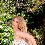 Pic of Blue-eyed and busty blonde gets completely naked on a couch outdoors - IamXXX.com