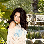 Pic of Long-haired and buxom brunette spreading her cheeks, masturbating - IamXXX.com