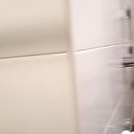 Pic of Tattooed redhead touches herself in the bathroom - AmateurPorn