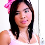 Pic of Young Asian girl in pink lingerie flashing her boobies and her tight pussy