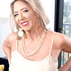 Pic of Blonde GILF Lacey West gives her younger lover a BJ prior to fucking – 60MILFs.com